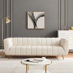 Canapé en cuir rembourré de style moderne du milieu du siècle Clovis de couleur crème