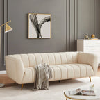Canapé en cuir rembourré de style moderne du milieu du siècle Clovis de couleur crème